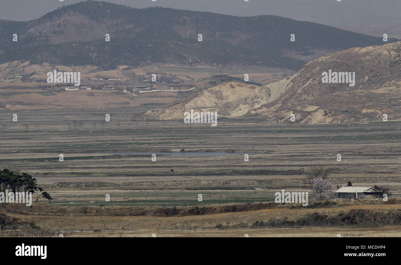Ganghwa Island, INCHEON, SOUTH KOREA. 16th Apr, 2018. April 16, 2018-Ganghwa Island, South Korea-A View of North Korea Hwanghae Province One Village. View from Ganghwa Island border village. North Korean people are actively preparing for spring farming. The agenda for the third inter-Korean summit scheduled for April 27 is unlikely to have North Korean human rights issues despite calls for the inclusion by more than 200 NGOs earlier this week. Credit: Ryu Seung-Il/ZUMA Wire/Alamy Live News Stock Photo