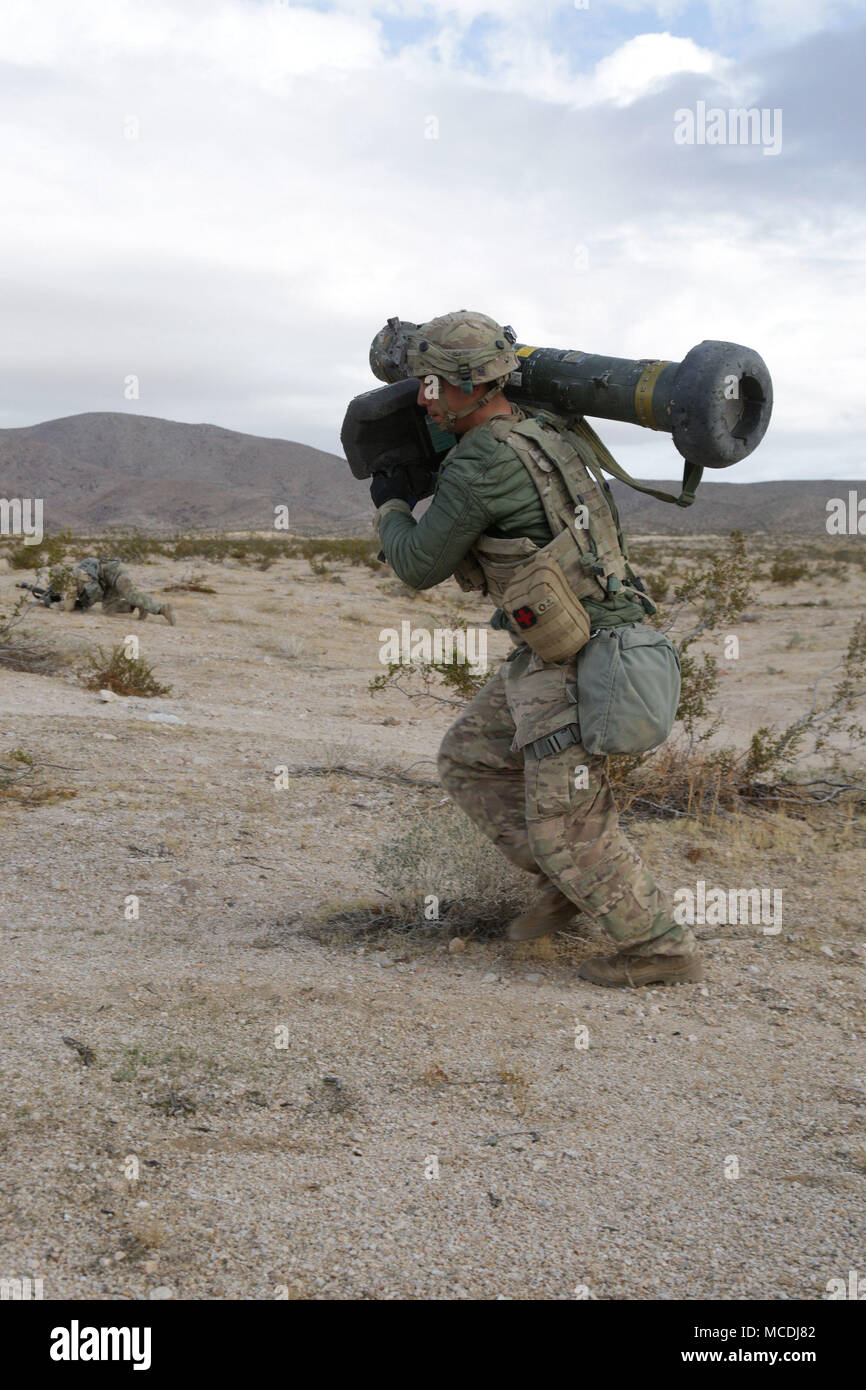 U.S. Soldiers assigned to 3rd Squadron, 3rd Cavalry Regiment, rush to ...