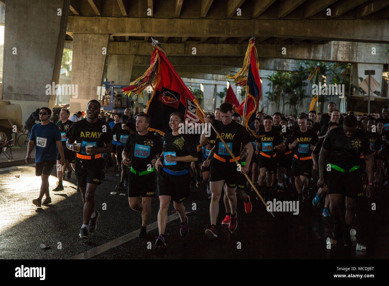 Soldiers from the 25th Infantry Division Sustainment Brigade join thousands of community members Feb. 19 for the 8.15-mile Great Aloha Run in downtown Honolulu. The foot race has raised more than $12 million for 150 non-profit health and human service organizations and community groups throughout Hawaii over the past 34 years, according to Carole Kai Charities, Inc. (Photo by 1st Lt. Ryan DeBooy, 2nd Brigade Combat Team, 25th Inf. Div.) Stock Photo