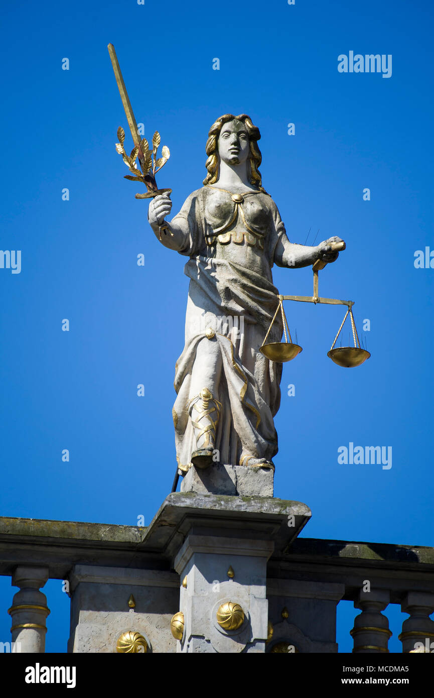 Figure of Iustitia (Justice) on a top pf Renaissance Zlota Brama (Golden Gate) in Main City in historic centre of Gdansk, Poland. April 14th 2018 © Wo Stock Photo