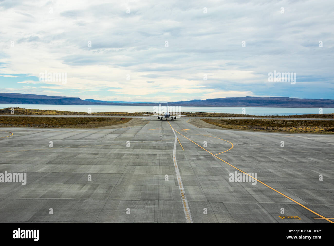 LAN or LATAM commercial jet, El Calafate Airport, FTE, El Calafate, Argentina Stock Photo