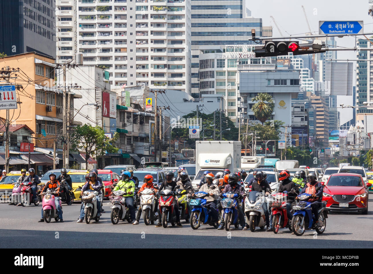 Motorbikes waiting at traffic lights, junction Asoke and Sukhumvit
