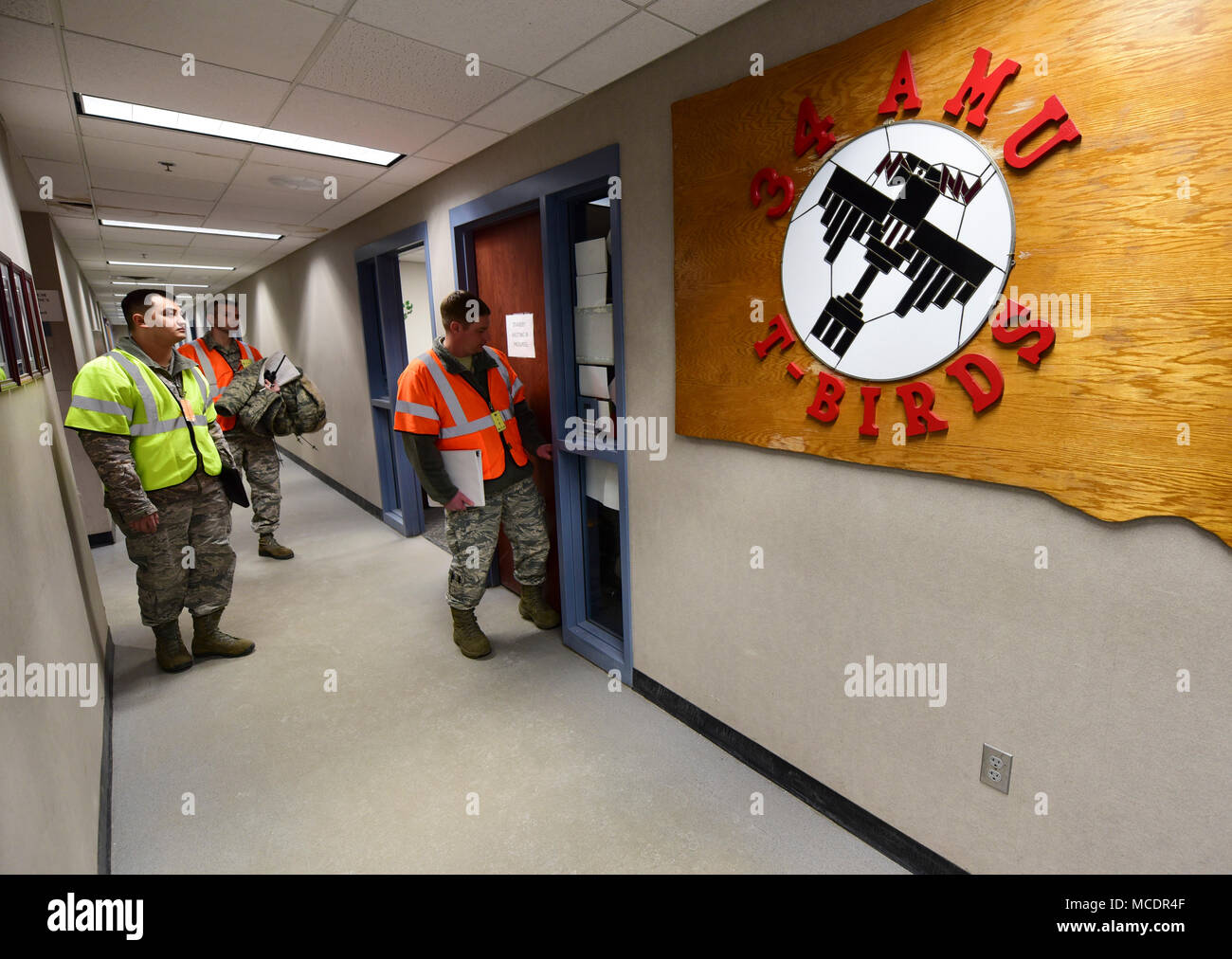 A wing inspection team conducts an active shooter exercise inside the