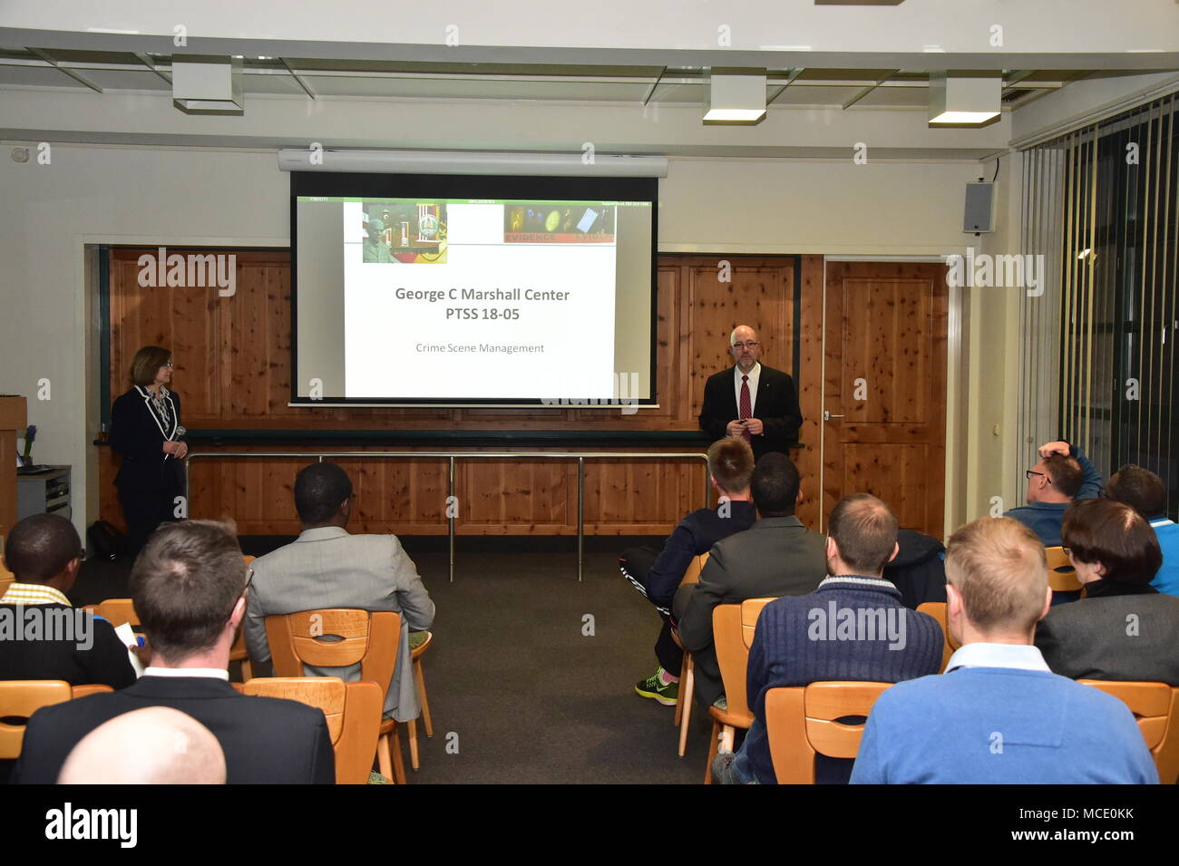 Special Agents Thomas F. O’Connor and Jean K O’Connor, both with the Federal Bureau of Investigation’s Joint Terrorism Task Force, talk about Evidence and Prosecution to 68 security professionals from 45 countries attending the Program on Terrorism and Security Studies Feb. 26 at the George C. Marshall European Center for Security Studies in Garmisch-Partenkirchen. (Marshall Center photo by U.S. Army Sgt. Richard Gerszewski) Stock Photo