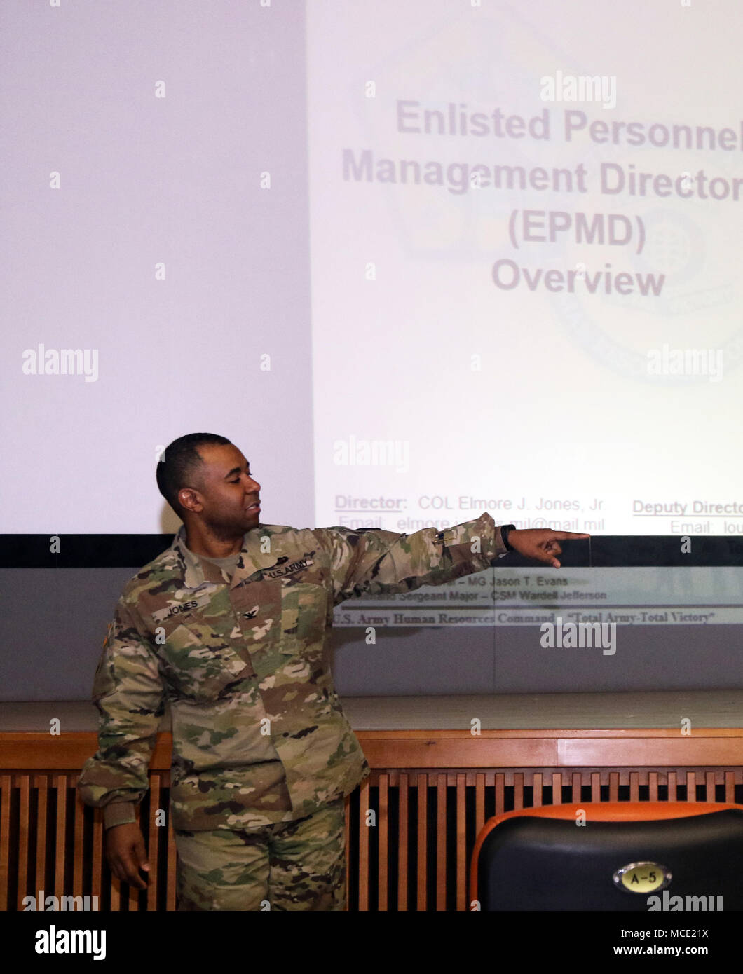 CAMP RED CLOUD, Republic of Korea—A 2nd Infantry Division ROK-U.S. Combined Division Soldier asks a question of the Human Resources Command Enlisted Personnel Management Directorate team during a brief at the post theater Feb. 22. The EPMD team discussed their mission and priorities with Warrior Division Soldiers, addressing the topics of readiness, manning, and how the DoD retention policy affects their mission. (U.S. Army Photo by Cpl. Kim, Yeon Yo, 2ID/RUCD Public Affairs) Stock Photo