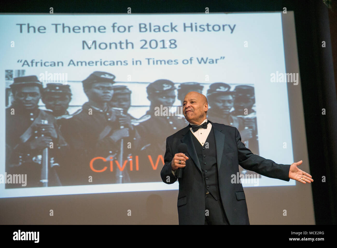 Mr. Harvey Alston, a motivational speaker, educator and former football coach, gives words of encouragement as the guest speaker for Team Redstone's Black History Month celebration honoring 'African Americans in Times of War'  Feb. 28, 2018, at Redstone Arsenal, Alabama. (U.S. Army photo by Sgt. 1st Class Teddy Wade) Stock Photo
