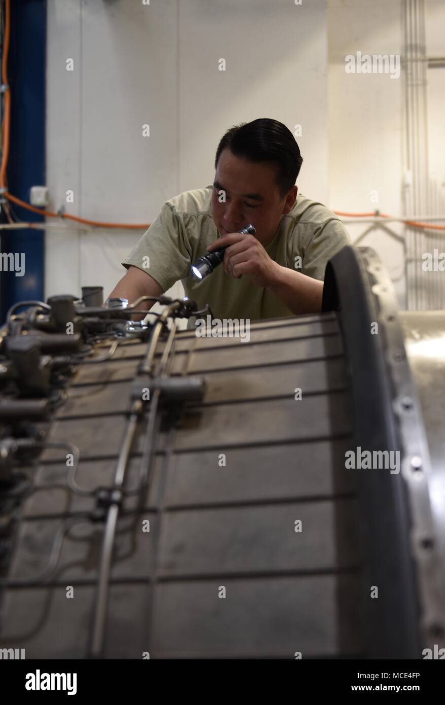 U.S. Air Force Staff Sgt. Tony Darden, 7th Component Maintenance Squadron aerospace  propulsion craftsman, inspects the parts of an engine at Dyess Air Force  Base, Texas, Feb. 26, 2018. Every engine that