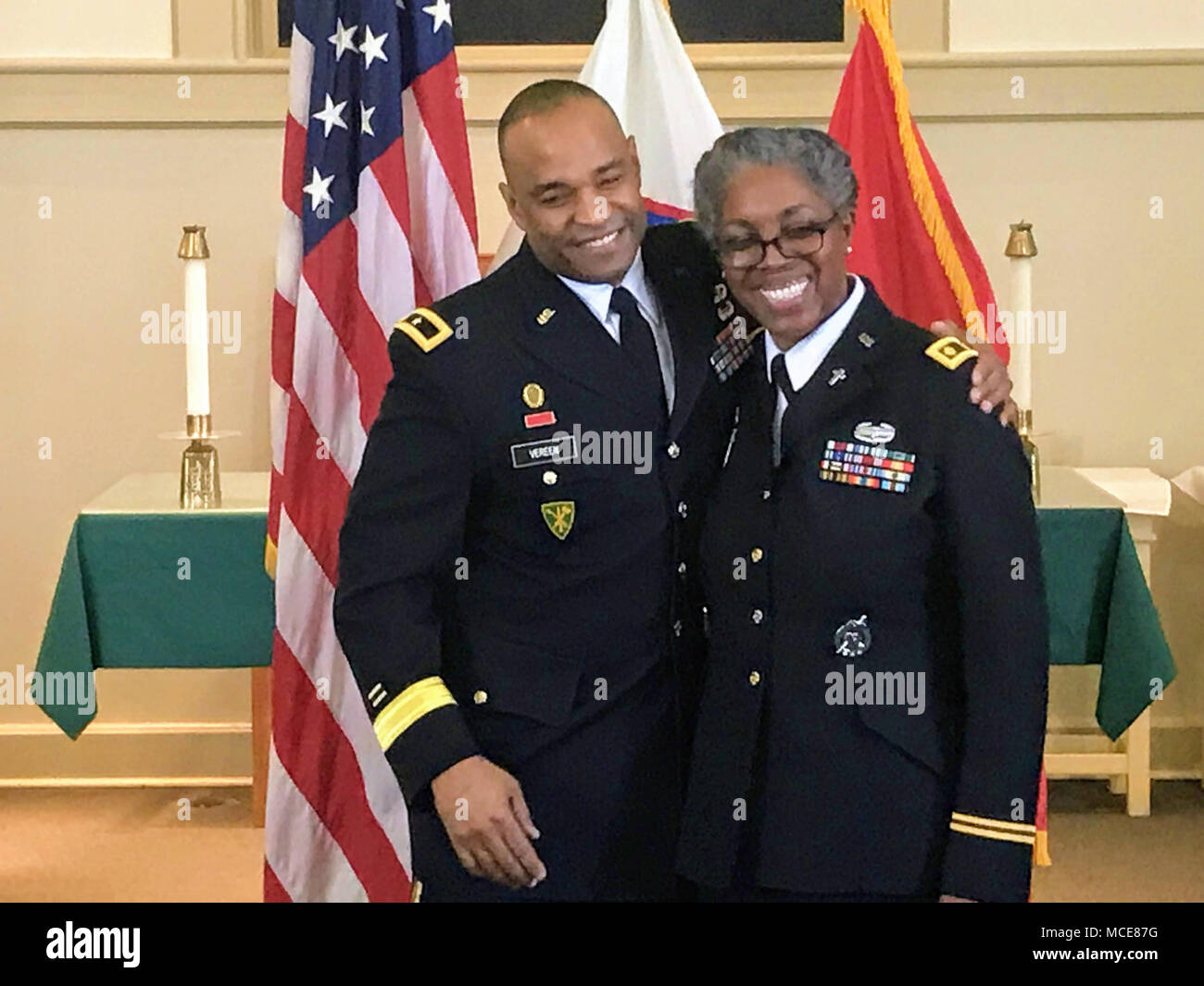 (l. to r.) Brig. Gen. Kevin Vereen, U.S. Army Recruiting Command Operations deputy commanding general, congratulates Chaplain (Maj.) Sharon Browne, a recruiter with the Southcentral Army Chaplain Recruiting Center, 5th Medical Recruiting Battalion, after making her promotion to major official in a ceremony Feb. 9 at the Robert P. Taylor Memorial Chapel on Naval Air Station Joint Reserve Base-Fort Worth, Texas. Stock Photo
