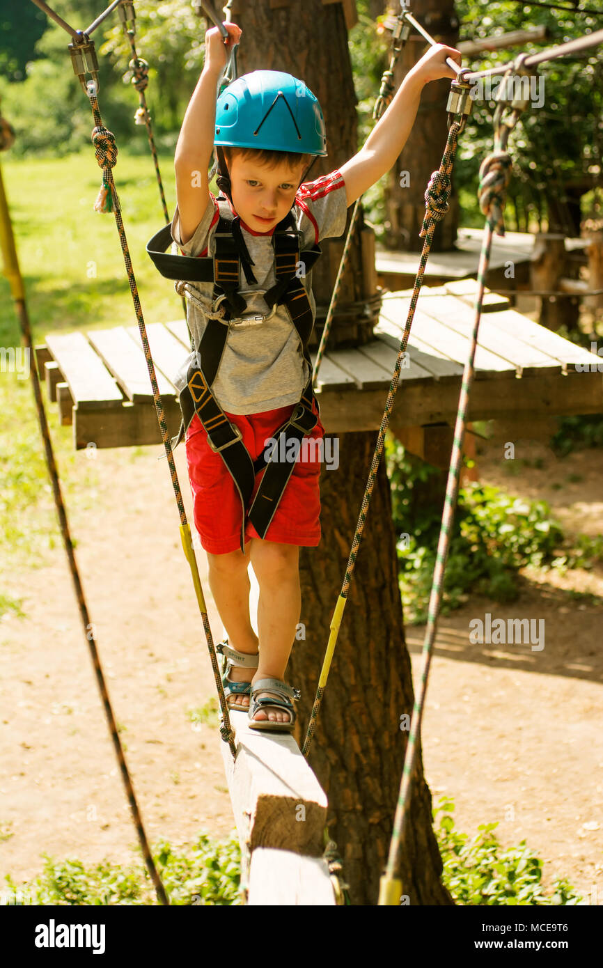 Boy Using A Rope Boy on rope way in hi-res stock photography and images - Alamy