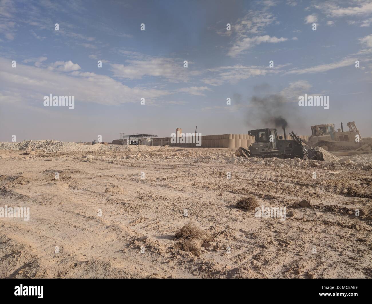 The archival image documents Army Reserve engineers leveling and ...