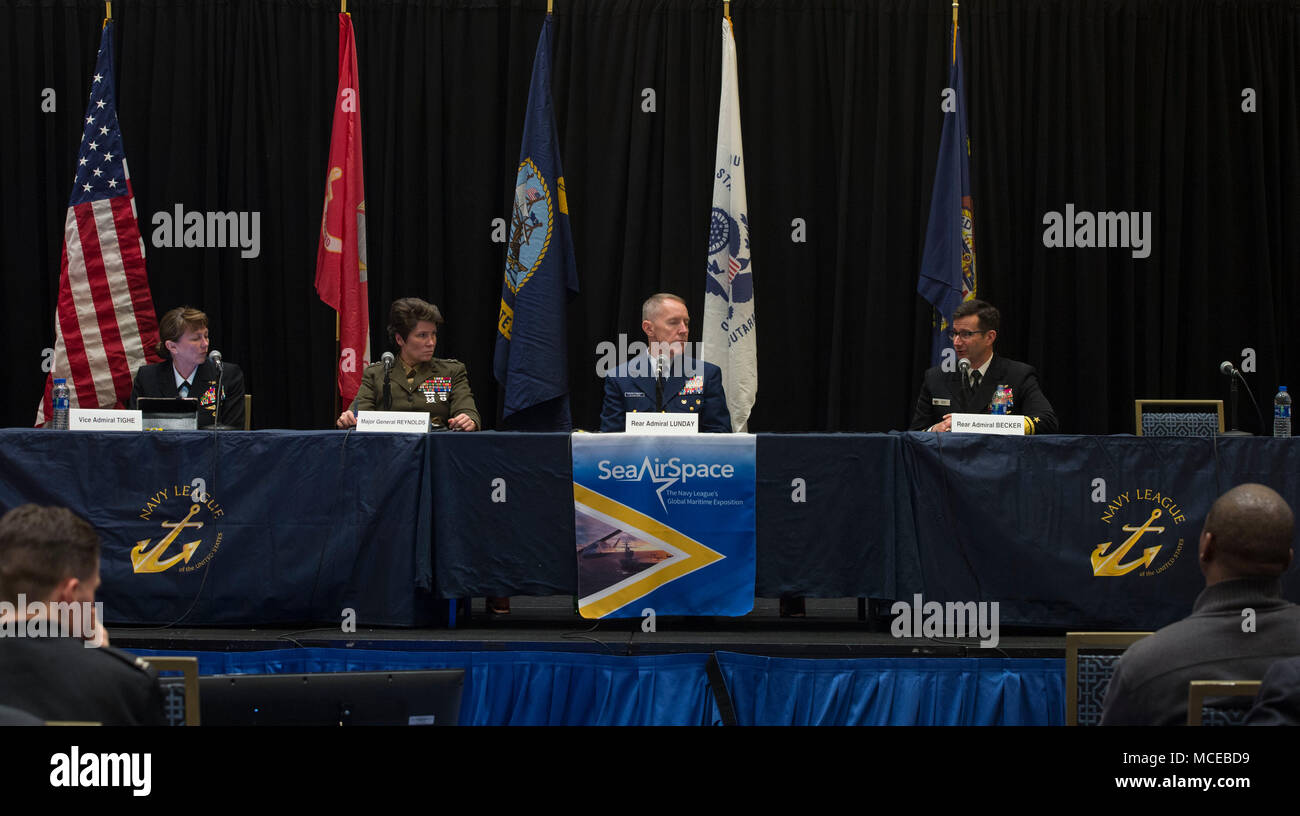 180410-N-YM856-067 NATIONAL HARBOR, Md. (Apr. 10, 2018) Deputy Chief of Naval Operations for Information Warfare Vice Adm. Jan Tighe moderates a discussion on information warfare during the Cyber Operations panel at the 2018 Sea-Air-Space Exposition. The annual event hosted by the Navy League of the United States and brings together the U.S. defense industrial base, private-sector U.S. companies, and key military decision makers for an innovative, educational, and professional maritime based event. (U.S. Navy photo by Mass Communication Specialist 2nd Class Brittney Cannady/Released) Stock Photo