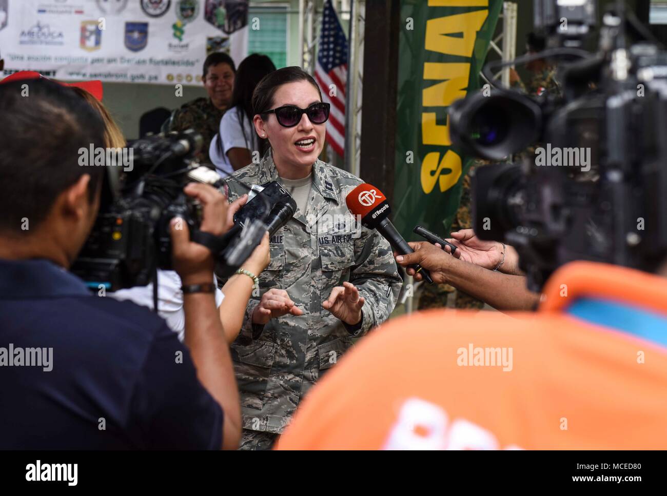 U.S. Air Force Capt. Rosimar Varela-Gradaille, 346th Air Expeditionary Group legal advisor, who is deployed from Eglin Air Force Base, Fla., speaks to local media during the opening ceremony of Exercise New Horizons 2018, April 11, 2018 in Meteti, Panama. The joint-service exercise will provide readiness training to U.S. military members, while also benefiting local communities throughout the country. During the exercise, U.S. military members will build three schools, one community center and a women’s health ward in the Meteti area. They will also work closely with Panamanian health provider Stock Photo