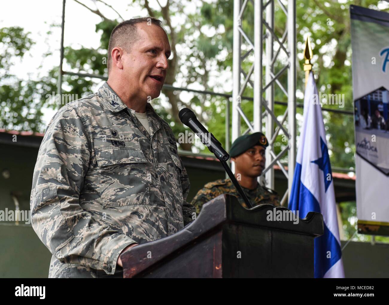 U.S. Air Force Col. Darren Ewing, 346th Air Expeditionary Group commander, speaks to guests at the opening ceremony of Exercise New Horizons 2018, April 11, 2018, in Meteti, Panama. During the exercise, U.S. military members will build three schools, one community center and a women’s health ward in the Meteti area. They will also work closely with Panamanian health providers bringing medical aid to people in the Darien, Coclé, and Veraguas Provinces. (U.S. Air Force photo by Senior Airman Dustin Mullen/Released) Stock Photo
