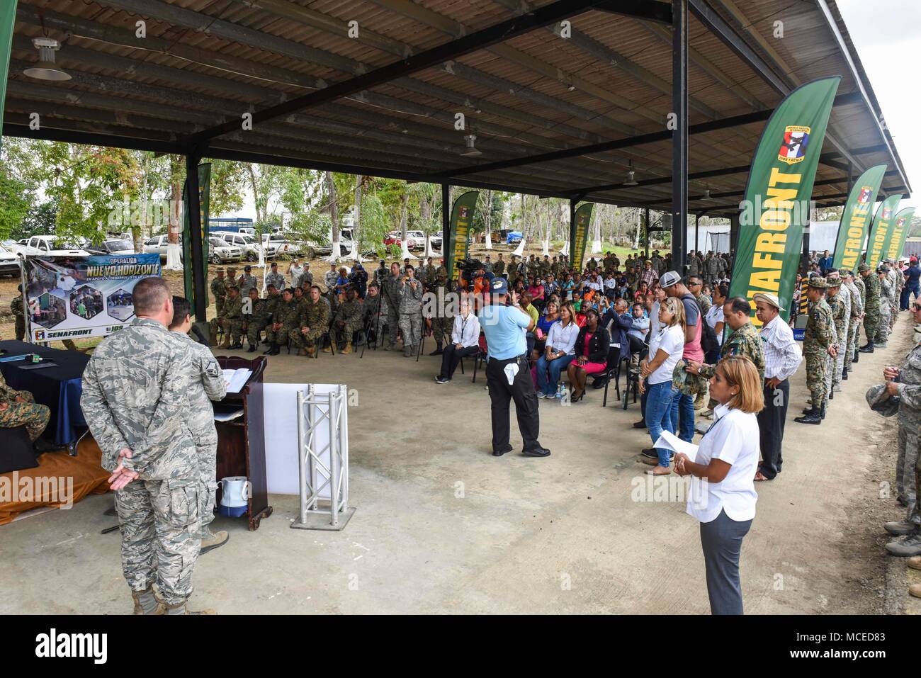 Guests attending the opening ceremony of Exercise New Horizons 2018 listen to speakers, April 11, 2018, in Meteti, Panama. During the exercise, U.S. military members will build three schools, one community center and on women’s health ward. They will also provide medical aid to people in the Darien, Darien, Coclé and Veraguas Provinces. During the exercise, U.S. military members will build three schools, one community center and a women’s health ward in the Meteti area. They will also work closely with Panamanian health providers bringing medical aid to people in the Darien, Coclé, and Veragua Stock Photo
