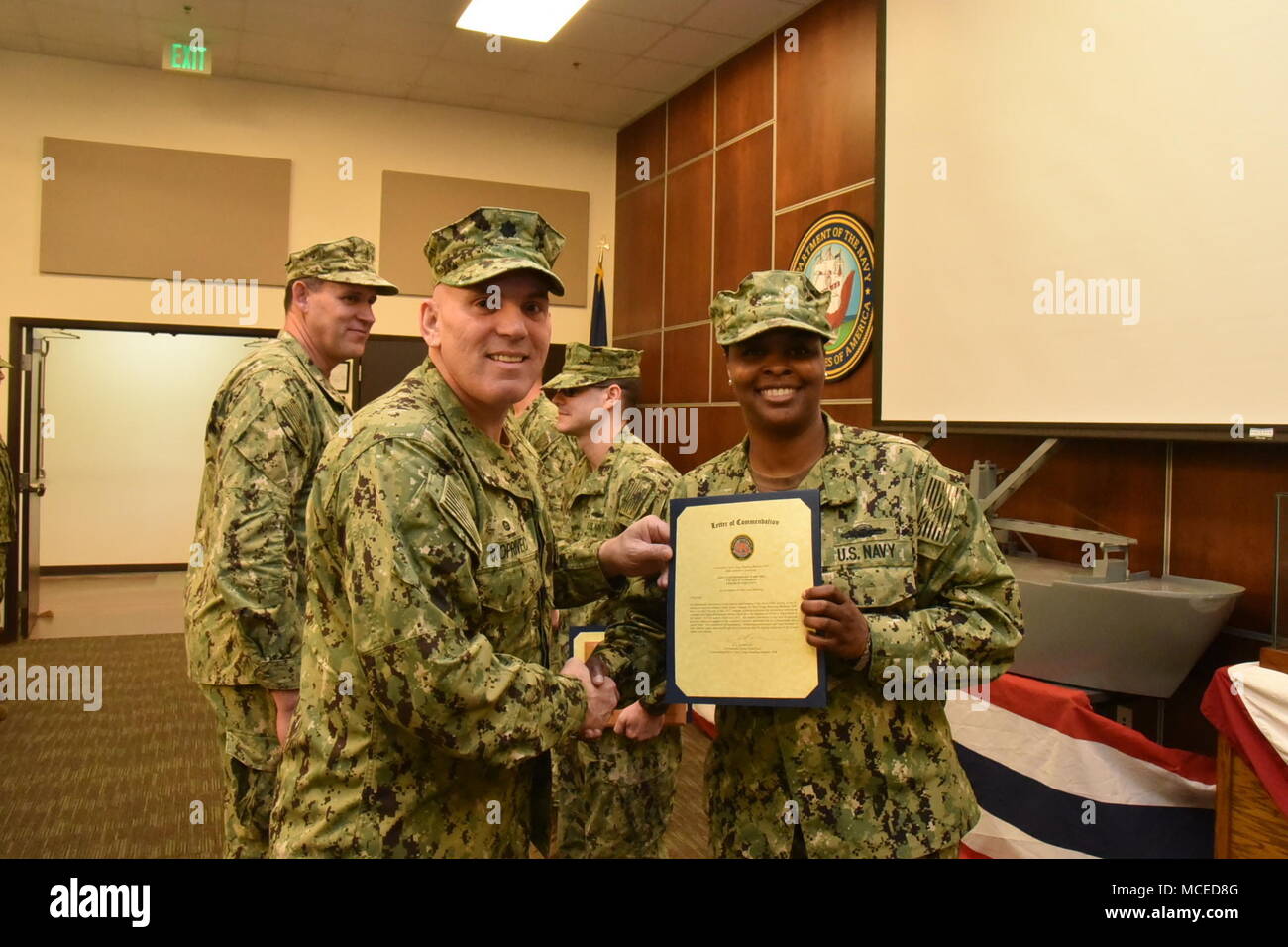 LSSN Anderson receives a letter of recommendation at All Hands on 13 April 18. NCHB-1 is the Navy's only active component cargo handling battalion. Stock Photo