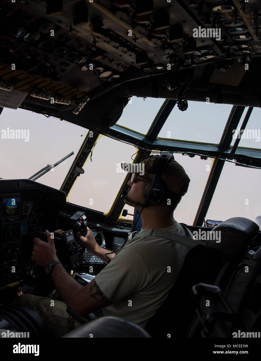A pilot from the West Virginia Air National Guard controls a C-130H Hercules April 10, 2018, in Niger. Approximately 1,900 service members from more than 20 African and western partner nations are participating in Flintlock 2018 at multiple locations in Niger, Burkina Faso, and Senegal. Flintlock is an annual, African-led, integrated military and law enforcement exercise that has strengthened key partner nation forces throughout North and West Africa as well as western Special Operations Forces since 2005.  (U.S. Air Force photo/Senior Airman Clayton Cupit) Stock Photo