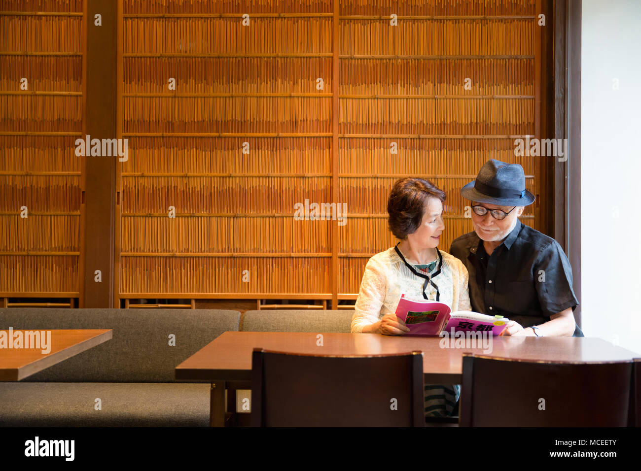 Senior couple reading books Stock Photo