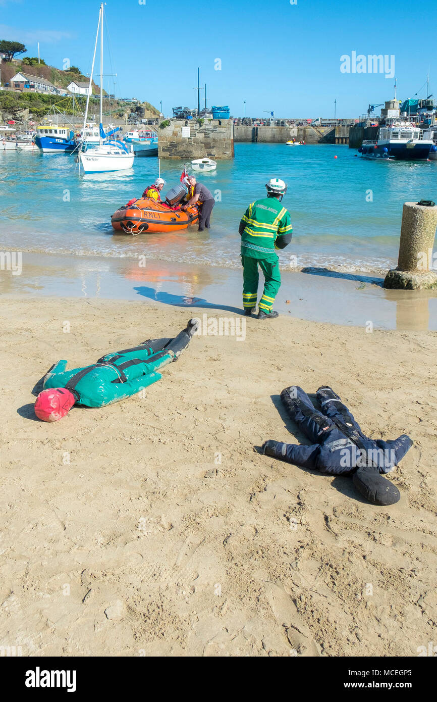 RNLI volunteers and ambulance paramedics participating in a realistic disaster exercise in Newquay Harbour in Cornwall. Stock Photo
