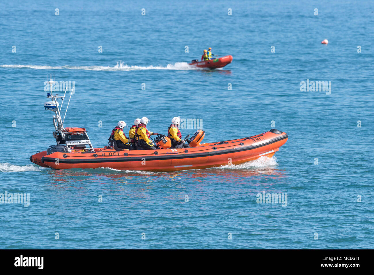 A RNLI crew in their B Class Atlantic 85 inshore rescue craft participating in a GMICE (Good Medicine in Challenging Environments) major incident exer Stock Photo