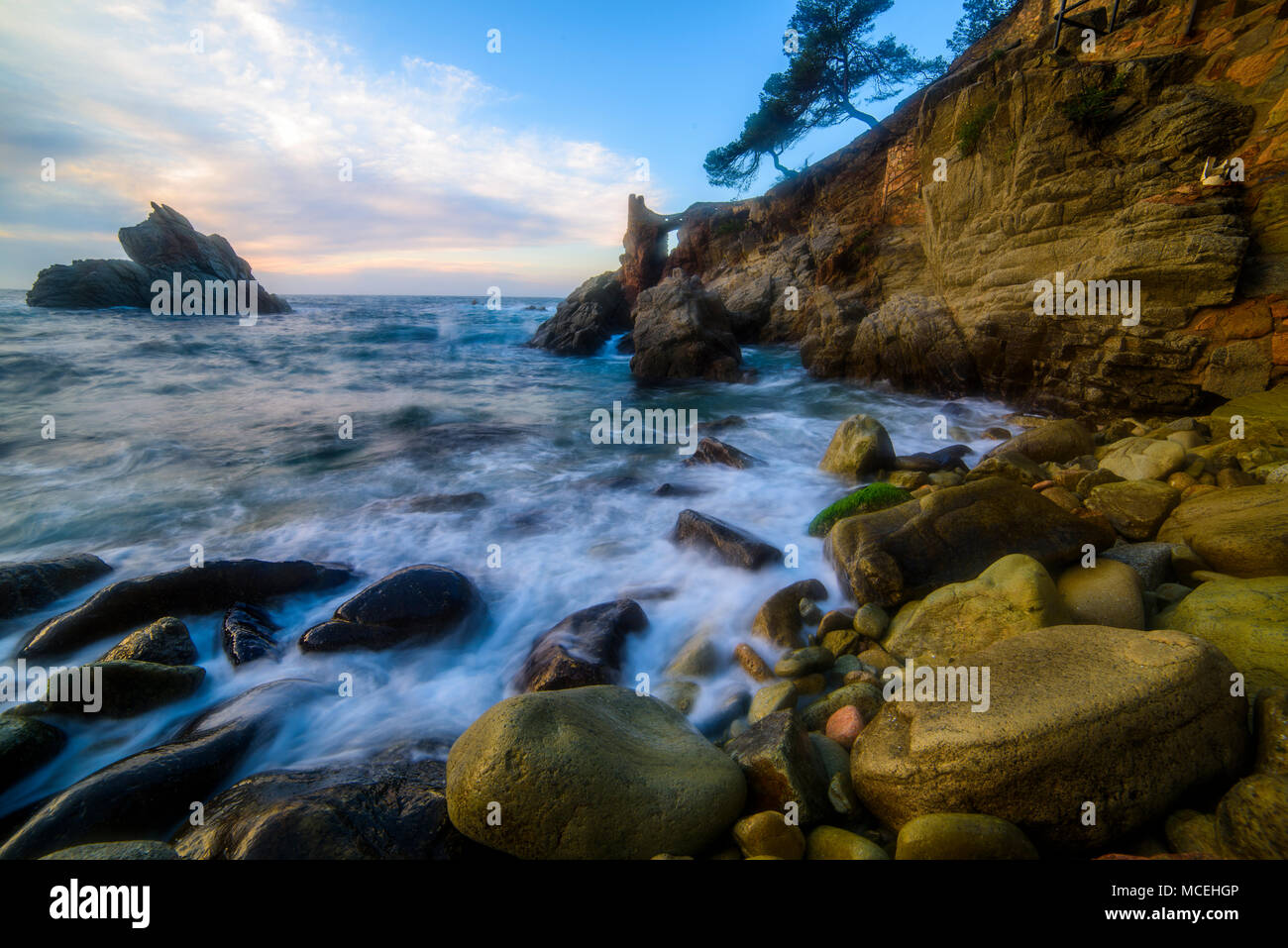 Lloret de mar, catalnia. Rocky Beach, sunrise Stock Photo