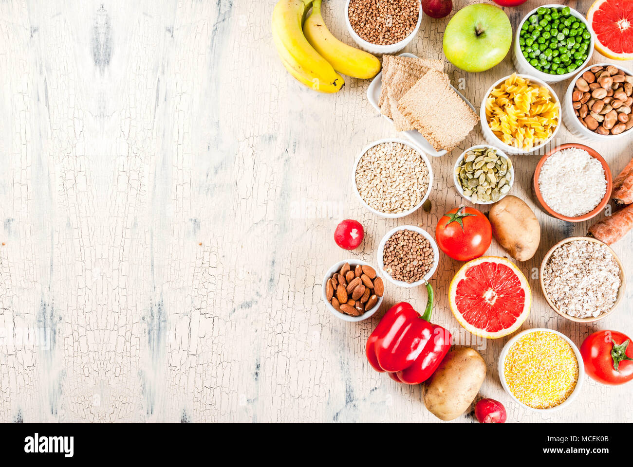 Diet food background concept, healthy carbohydrates (carbs) products fruits, vegetables