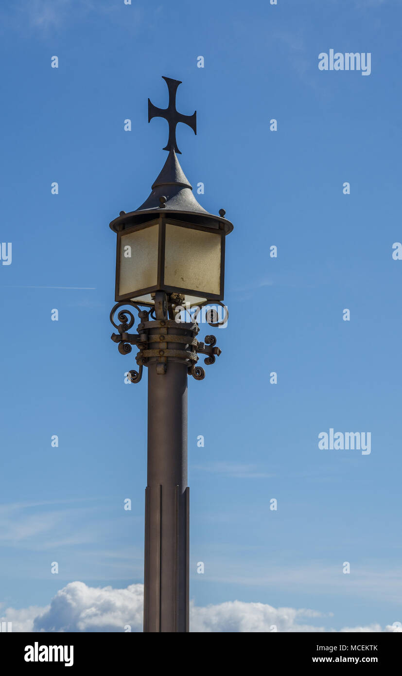 An ornate lamp at Montserrat pictured against a blue sky. Stock Photo