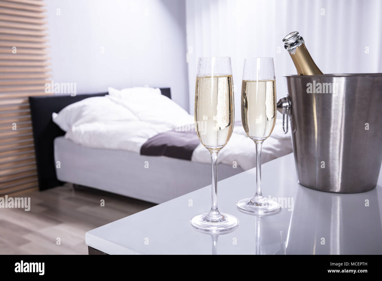 Two champagne glasses table hi-res stock photography and images - Alamy