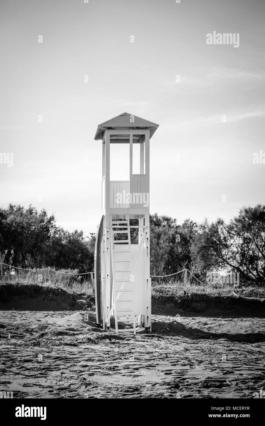 Lifeguard hut with trees at backdrop on beach, Greece Stock Photo