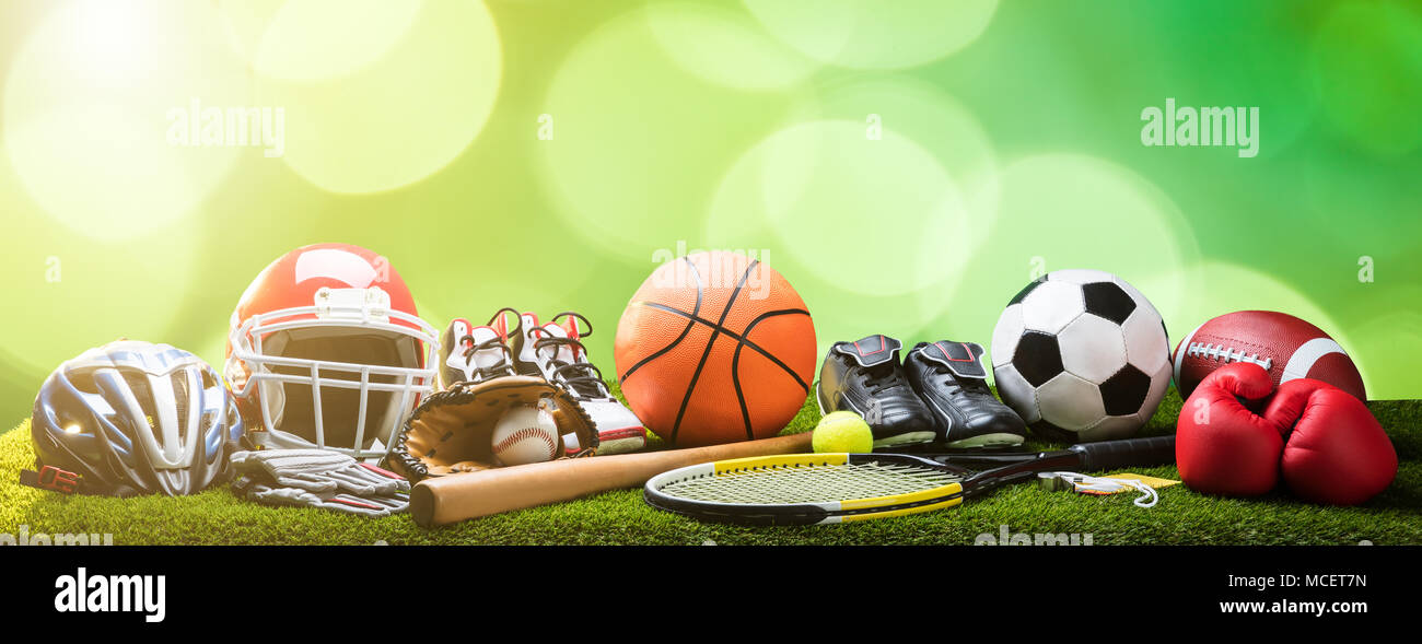 Closeup Of Various Sport Equipments On Pitch Against Bokeh Background