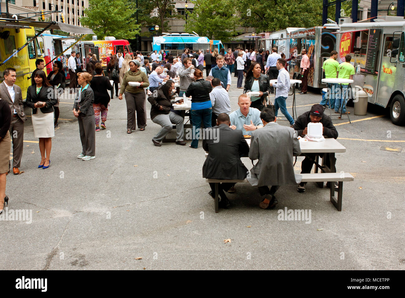 Customers Stand In Line To Buy Meals From Popular Food