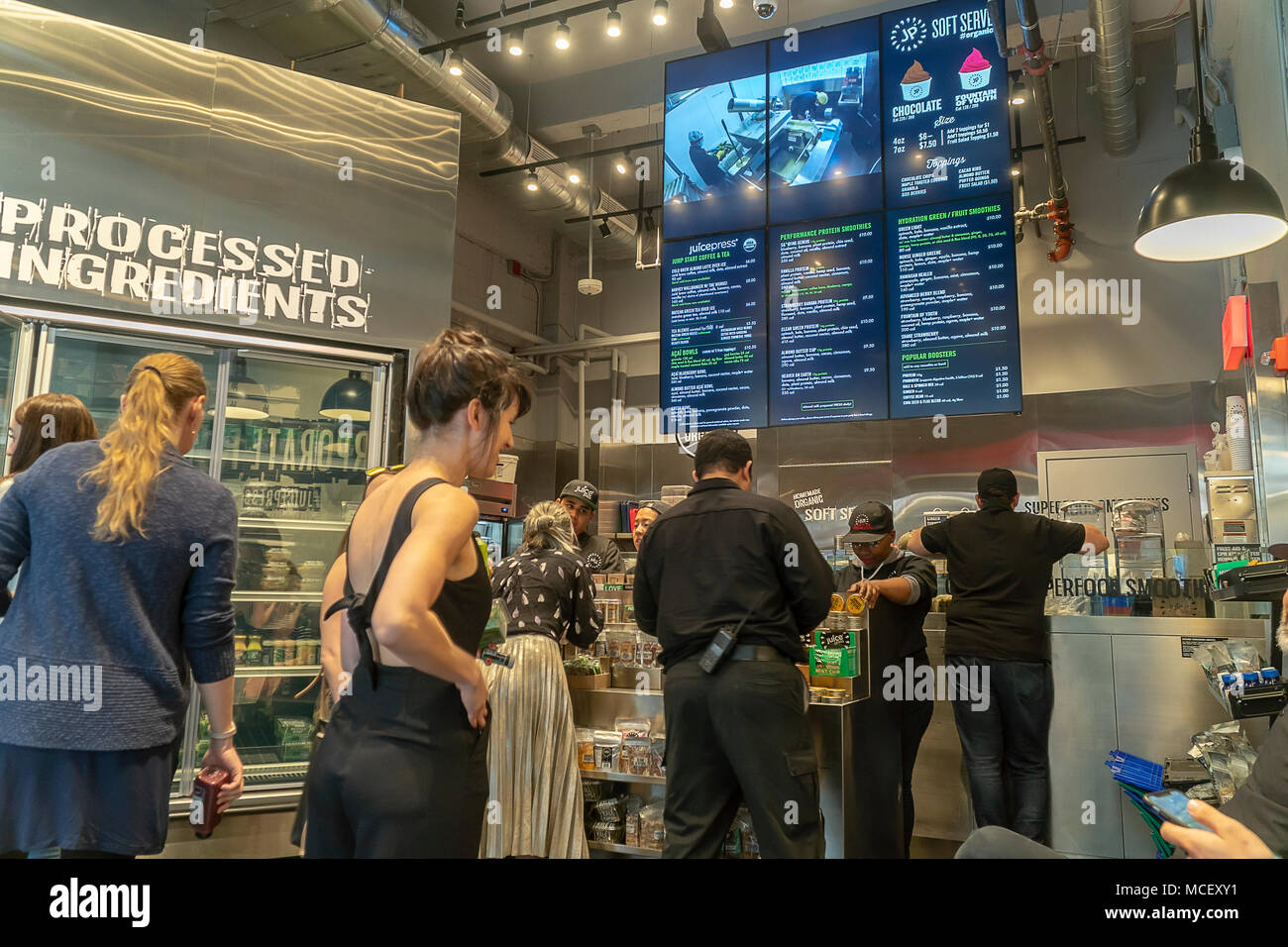 Hordes of millennials crowd the new Juice Press grand opening