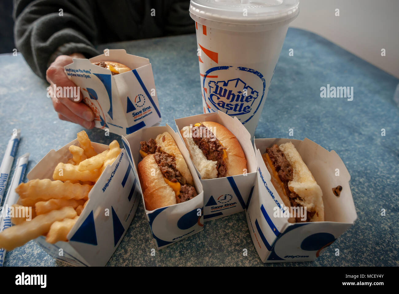 White Castle debuts the Impossible Slider using plant-based 'meat' from Impossible Foods, seen in a White Castle in Brooklyn in New York on Sunday, April 15, 2018. Impossible Foods meatless ground beef is being used to create the new menu item, previously only available in higher-end fast casual restaurants and is currently on the menu is 140 locations in the New York and Chicago areas.The sliders sell for $1.99, approximately double the price of their original product. (© Richard B. Levine) Stock Photo