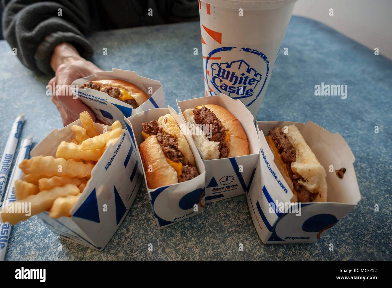 White Castle debuts the Impossible Slider using plant-based 'meat' from Impossible Foods, seen in a White Castle in Brooklyn in New York on Sunday, April 15, 2018. Impossible Foods meatless ground beef is being used to create the new menu item, previously only available in higher-end fast casual restaurants and is currently on the menu is 140 locations in the New York and Chicago areas.The sliders sell for $1.99, approximately double the price of their original product. (© Richard B. Levine) Stock Photo