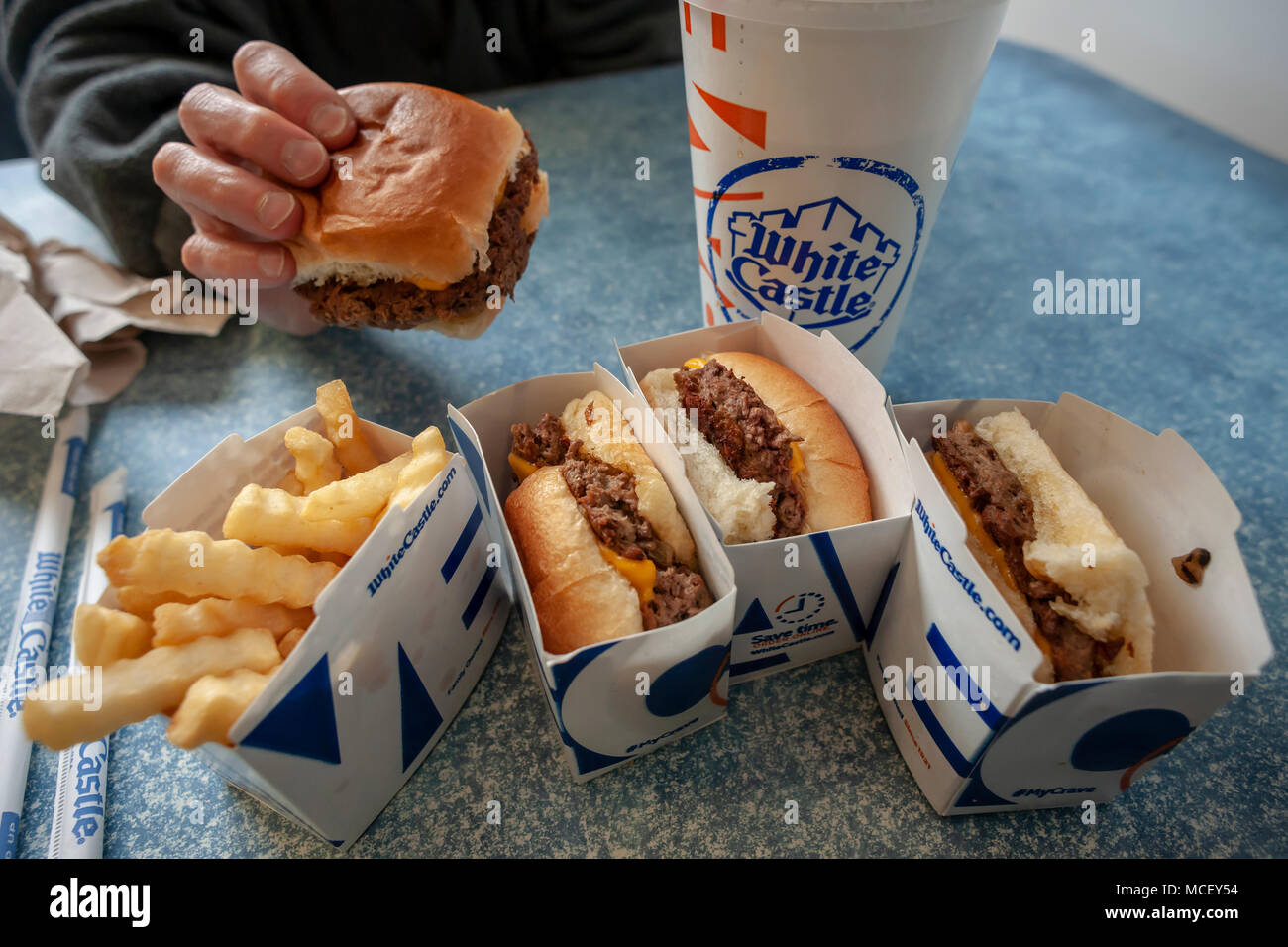 White Castle debuts the Impossible Slider using plant-based 'meat' from Impossible Foods, seen in a White Castle in Brooklyn in New York on Sunday, April 15, 2018. Impossible Foods meatless ground beef is being used to create the new menu item, previously only available in higher-end fast casual restaurants and is currently on the menu is 140 locations in the New York and Chicago areas.The sliders sell for $1.99, approximately double the price of their original product. (© Richard B. Levine) Stock Photo