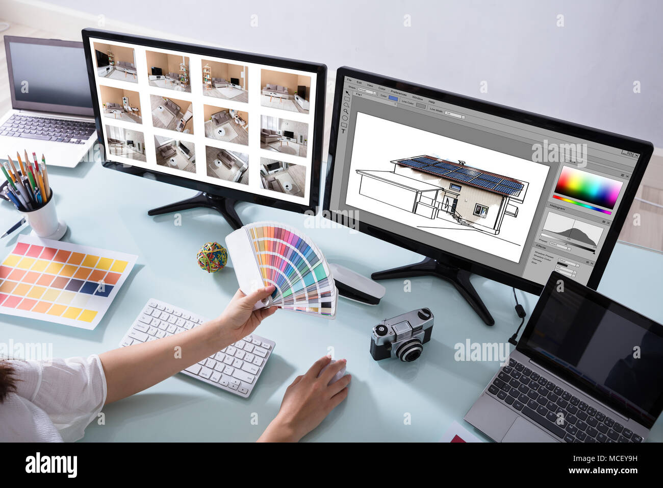 High Angle View Of A Female Designer Working On Color Selection For ...