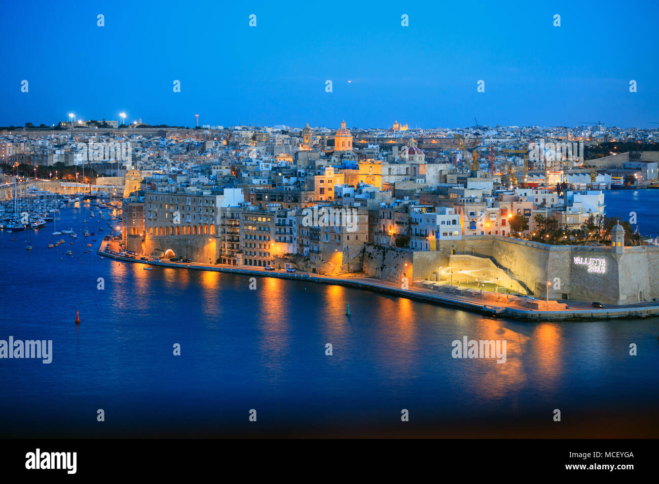 Valletta, Malta. Grand harbour view, Senglea from Upper Barrakka Gardens in the evening Stock Photo