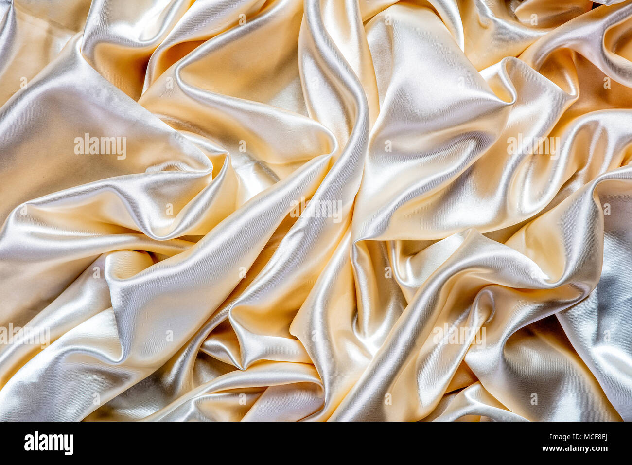 Texture Background Pattern Brown Silk Fabric Abstract Background Of Luxury  Fabrics Or Liquid Waves Or Wavy Creases Smooth Elegant Golden Silk Or Satin  In Sepia Toned Retro Style Stock Photo - Download