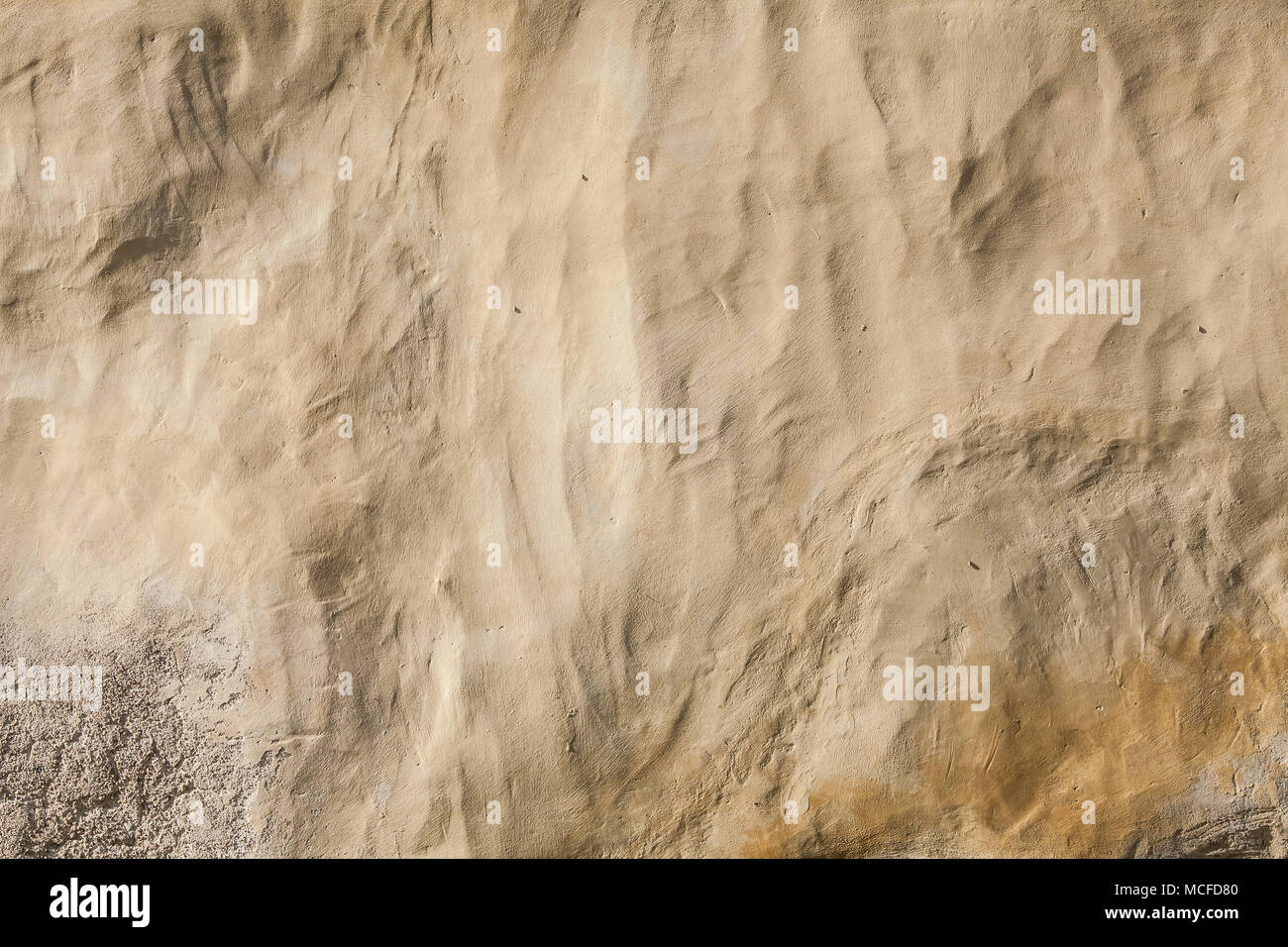Brown plaster wall Stock Photo