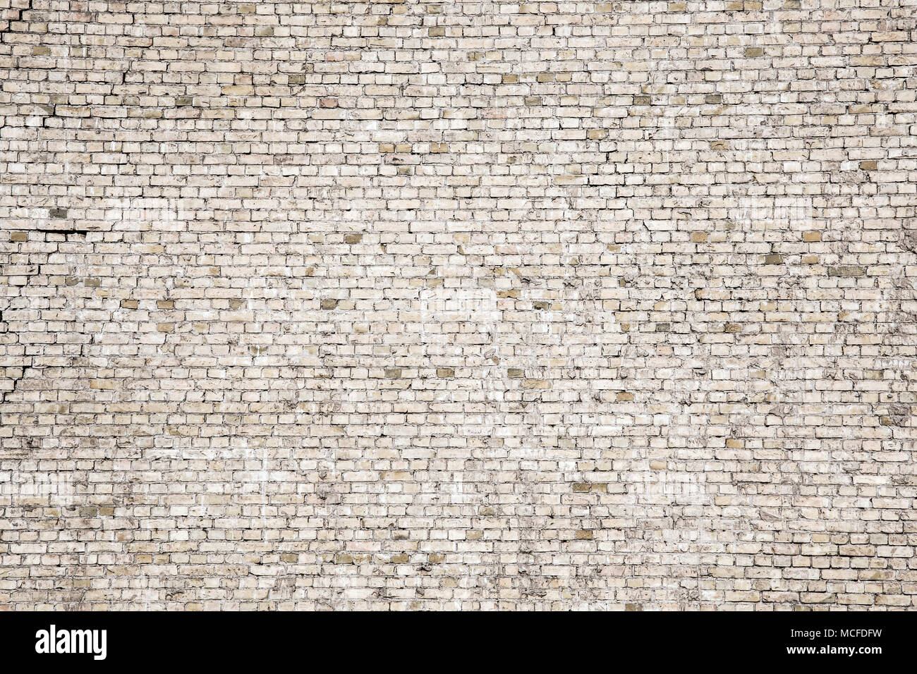 Cracked black brick wall Stock Photo