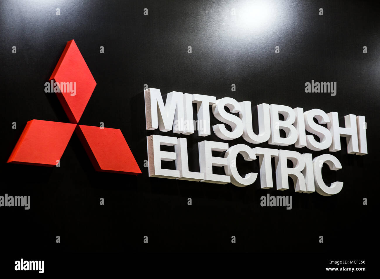 Mitsubishi logo japanese company sign on the wall Stock Photo