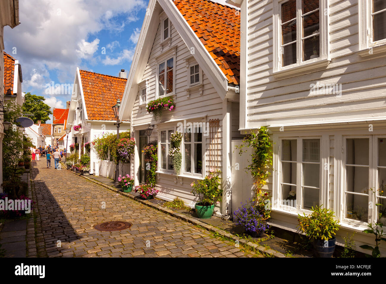 Street with white houses in the old part of Stavanger, Norway. Stock Photo