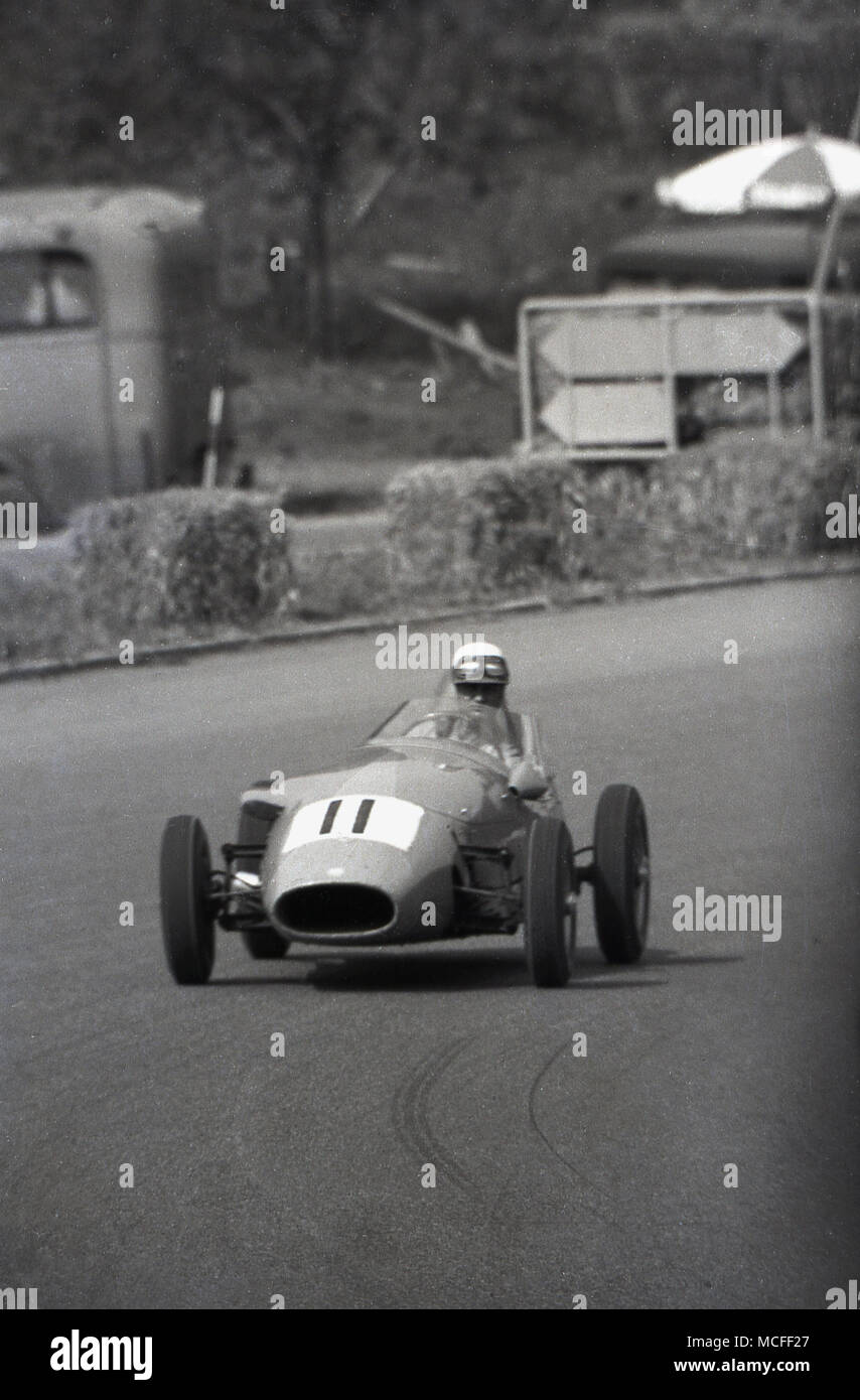 1960s, historical, a single seater, open-wheeled racing car being driven around a racetrack. Stock Photo