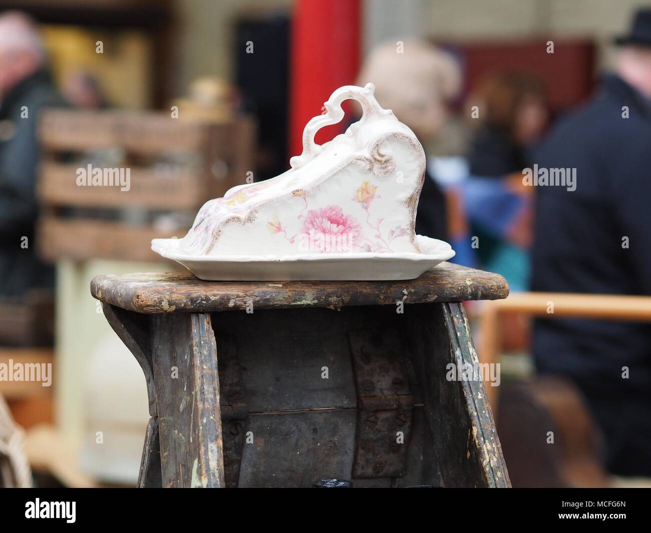 Antique Cheese dish and Cover on top of a step ladder at an Antiques