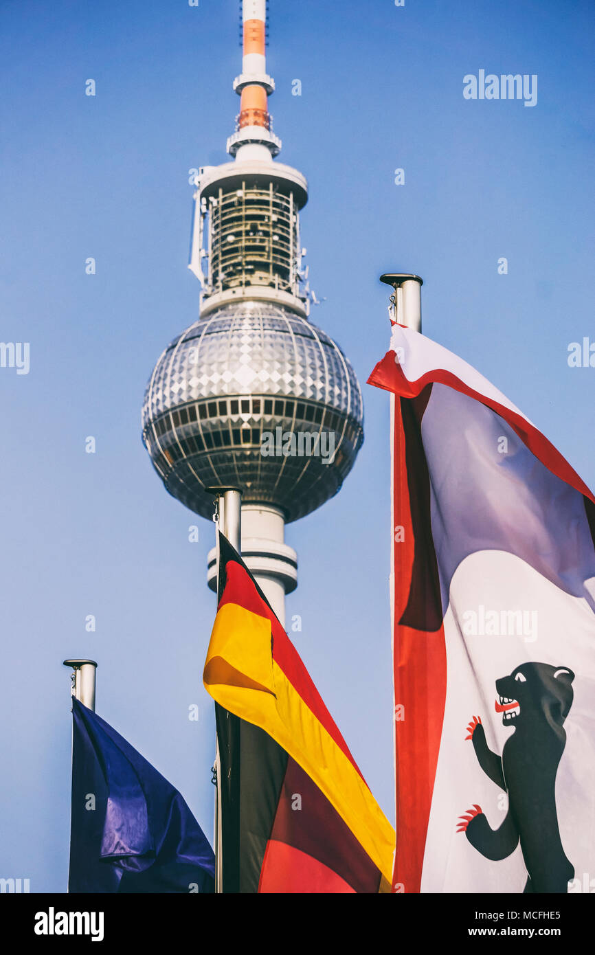 Berlin, German and EU flag in front of TV Tower Stock Photo
