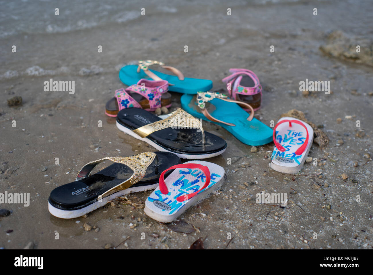 Pair of Beach sandals at Yas Island Abu Dhabi Stock Photo - Alamy