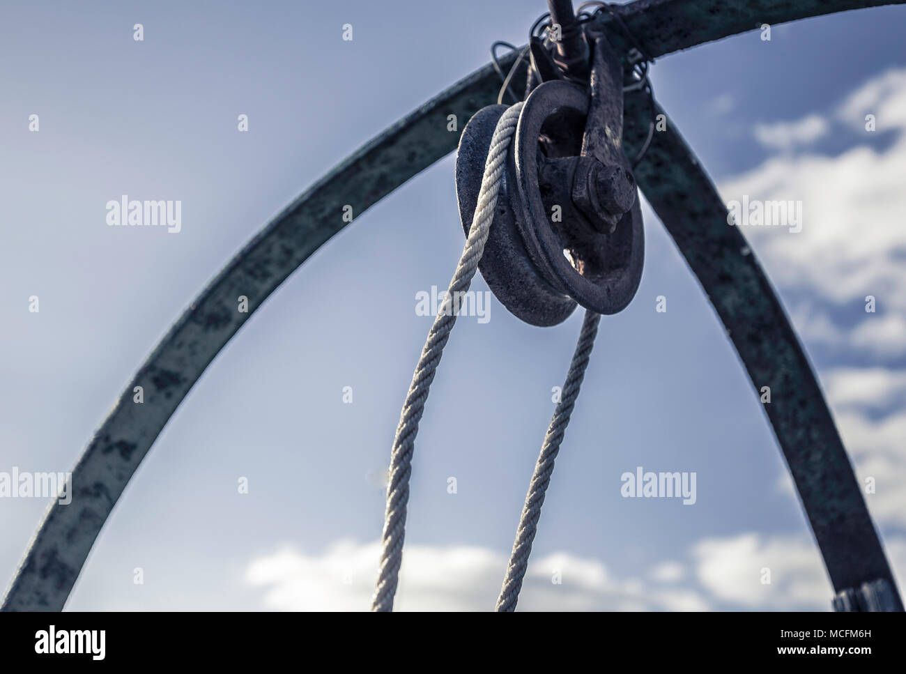 Rusty pulley from well Stock Photo