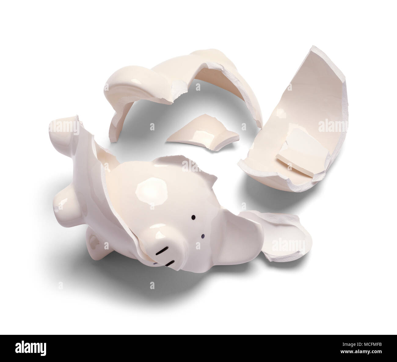 Broken Piggy Bank Isolated on a White Background. Stock Photo