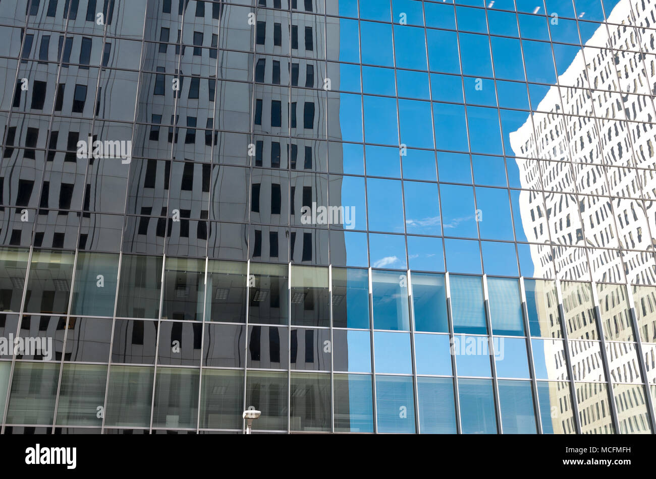 abstract of office buildings reflected on skyscraper glass in downtown minneapolis minnesota Stock Photo