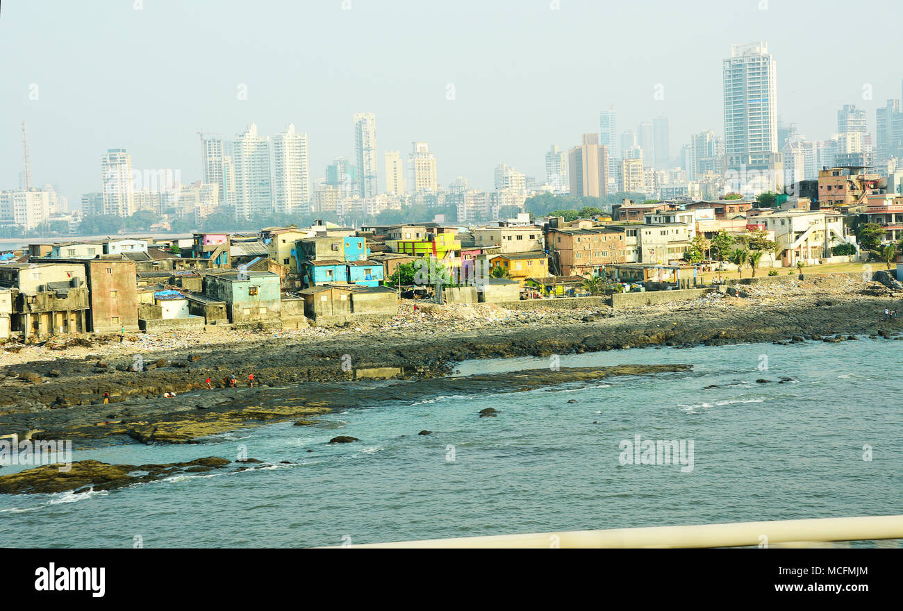 Mumbai slums juxtaposed against wealthy developing Mumbai skyline, india Stock Photo