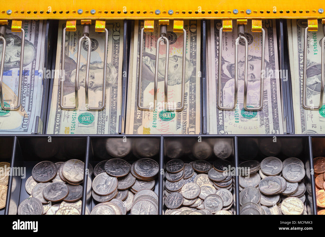 Open Cash Register Drawer Close up with Money. Stock Photo